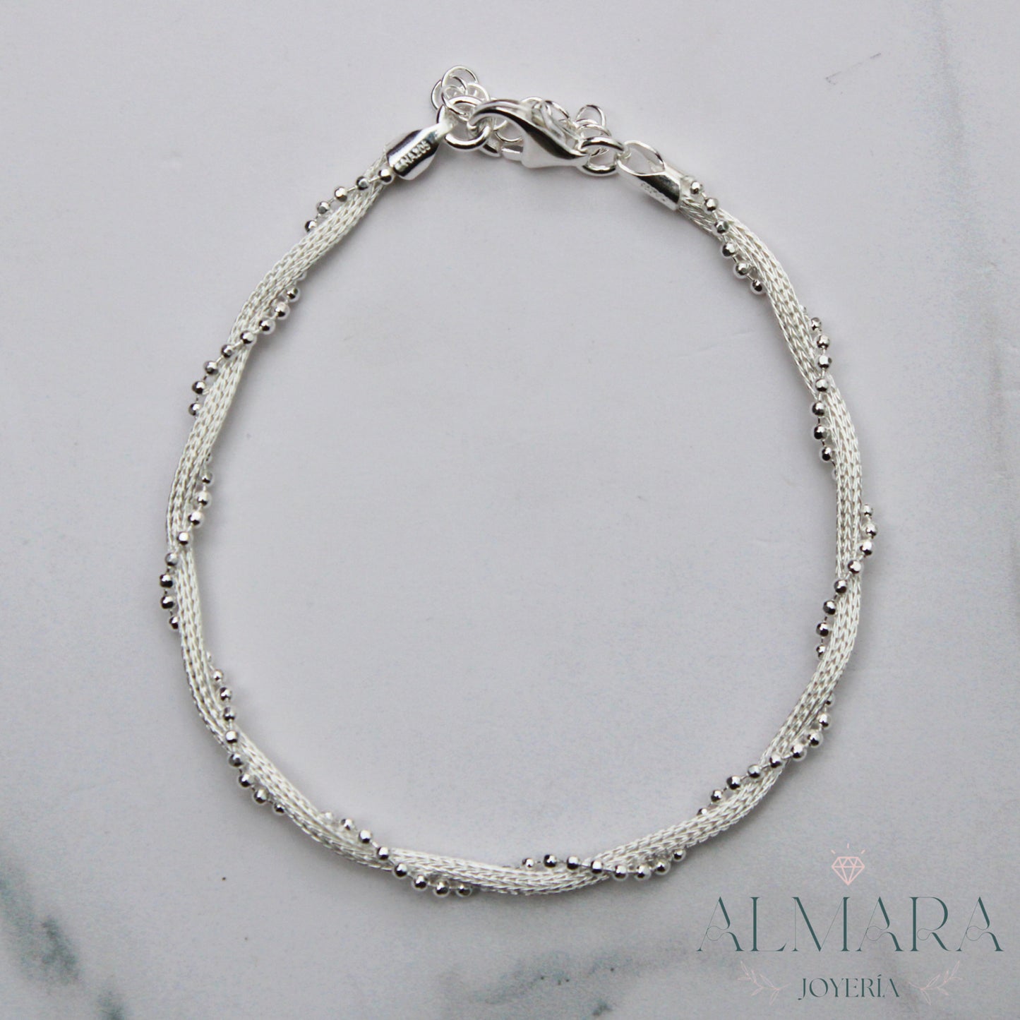 Pulsera Trenzada con Bolitas