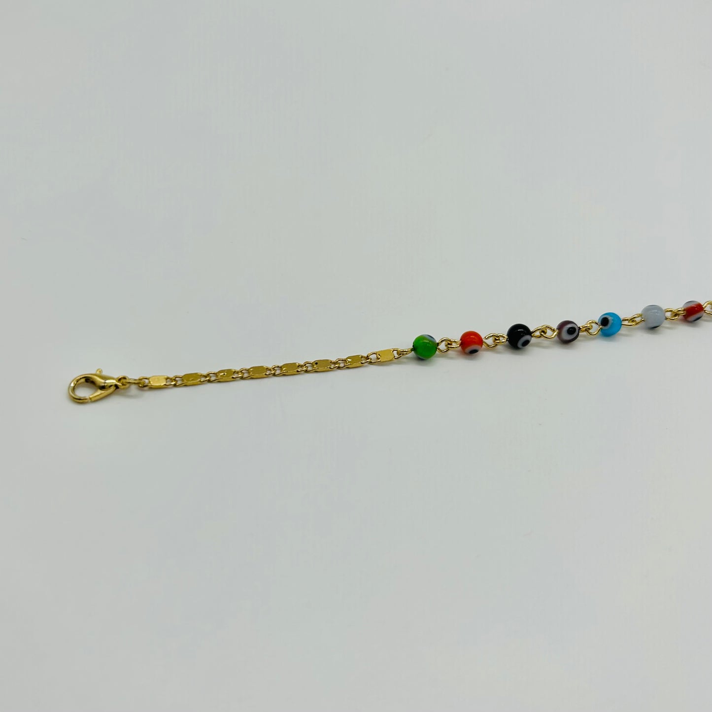 Pulsera de Ojitos de Colores de Oro Laminado