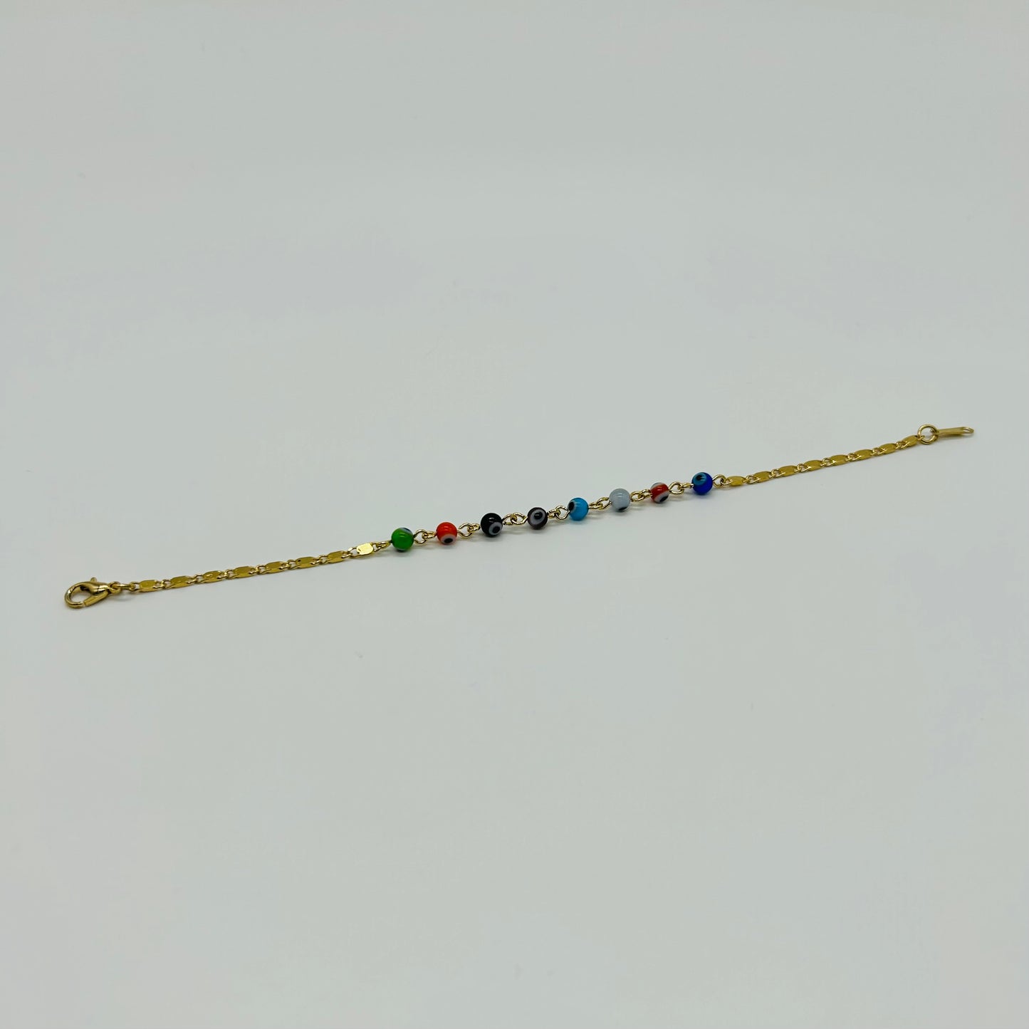 Pulsera de Ojitos de Colores de Oro Laminado