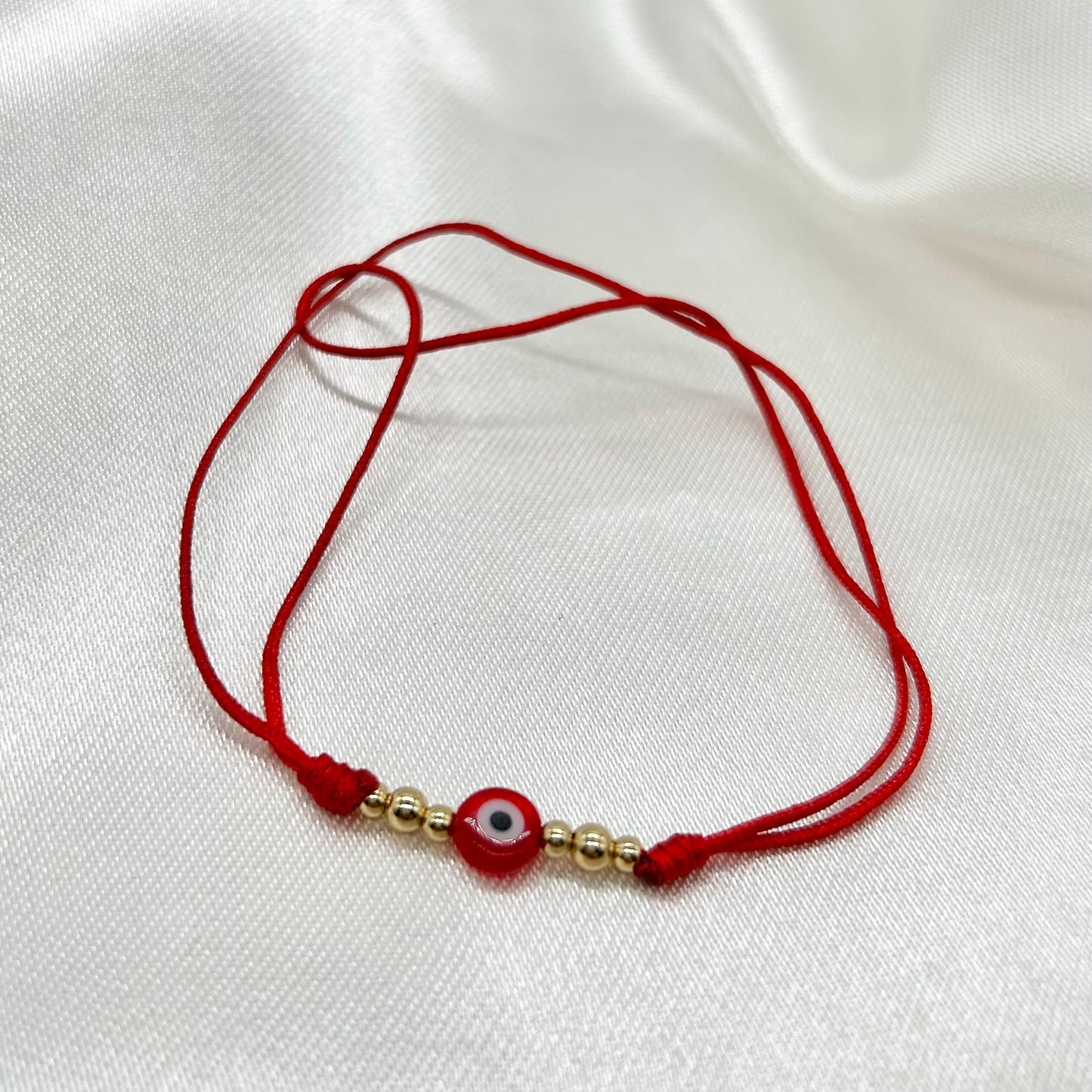 Pulsera Roja Tejida para la Protección con Ojito Turco