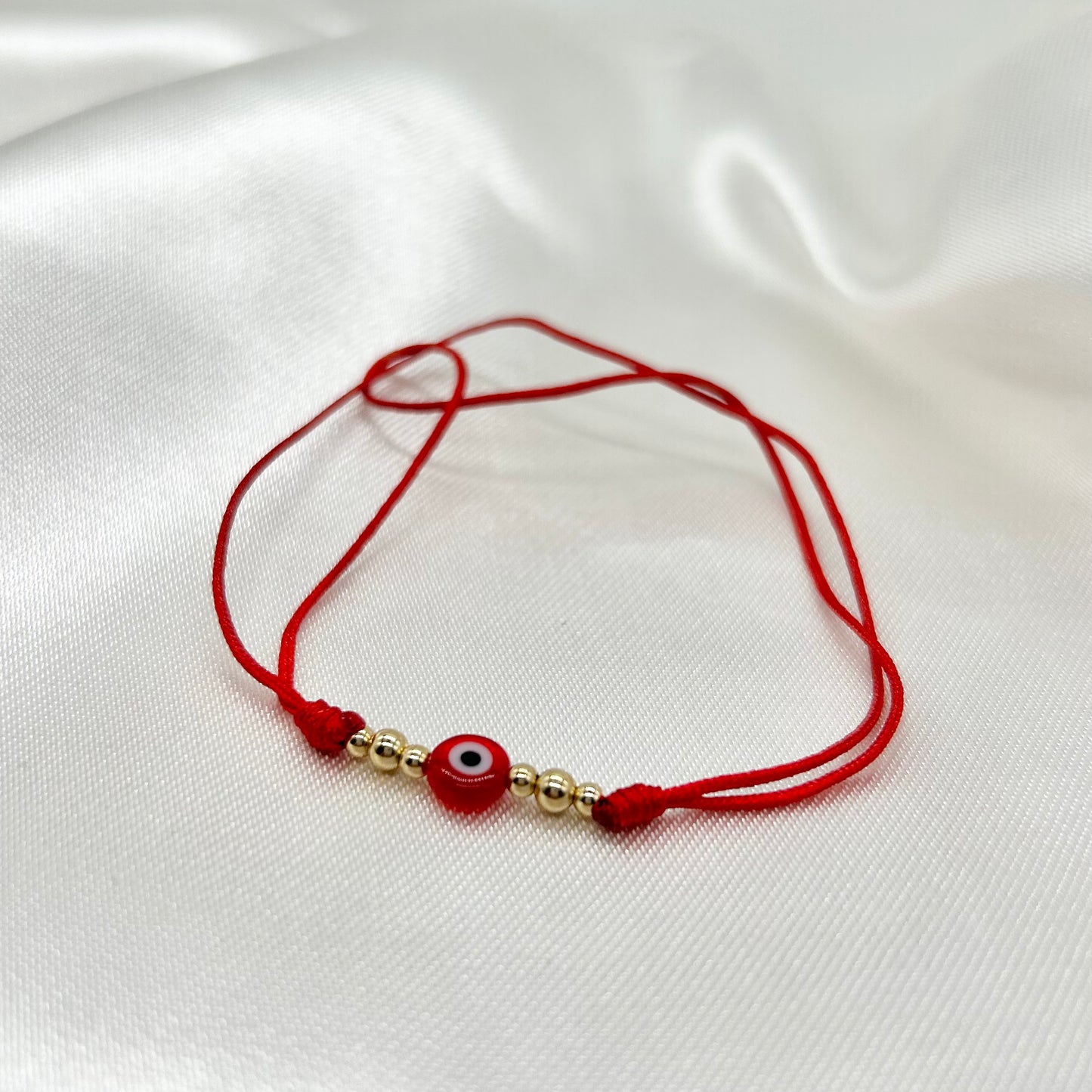 Pulsera Roja Tejida para la Protección con Ojito Turco