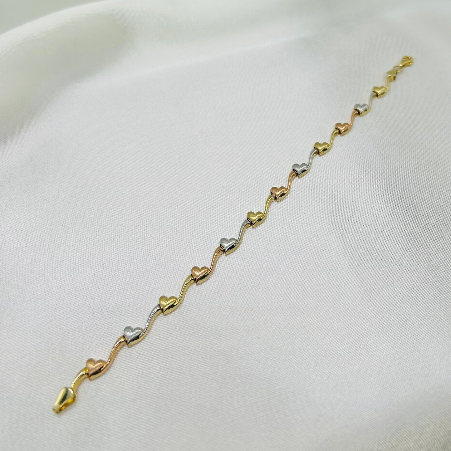 Pulsera Corazones en Tres Oros de 10K