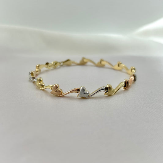 Pulsera Corazones en Tres Oros de 10K