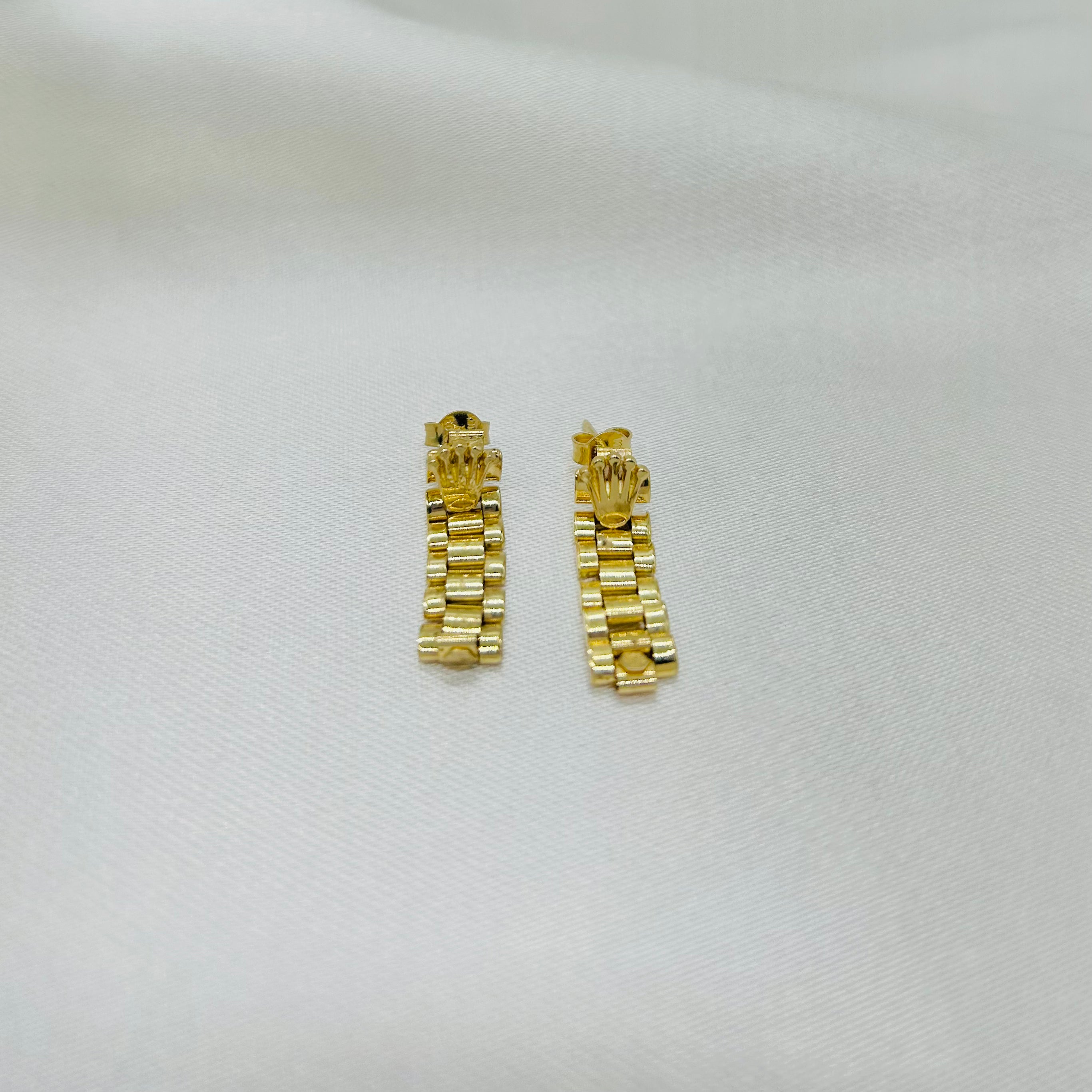 Aretes rolex mujer hotsell