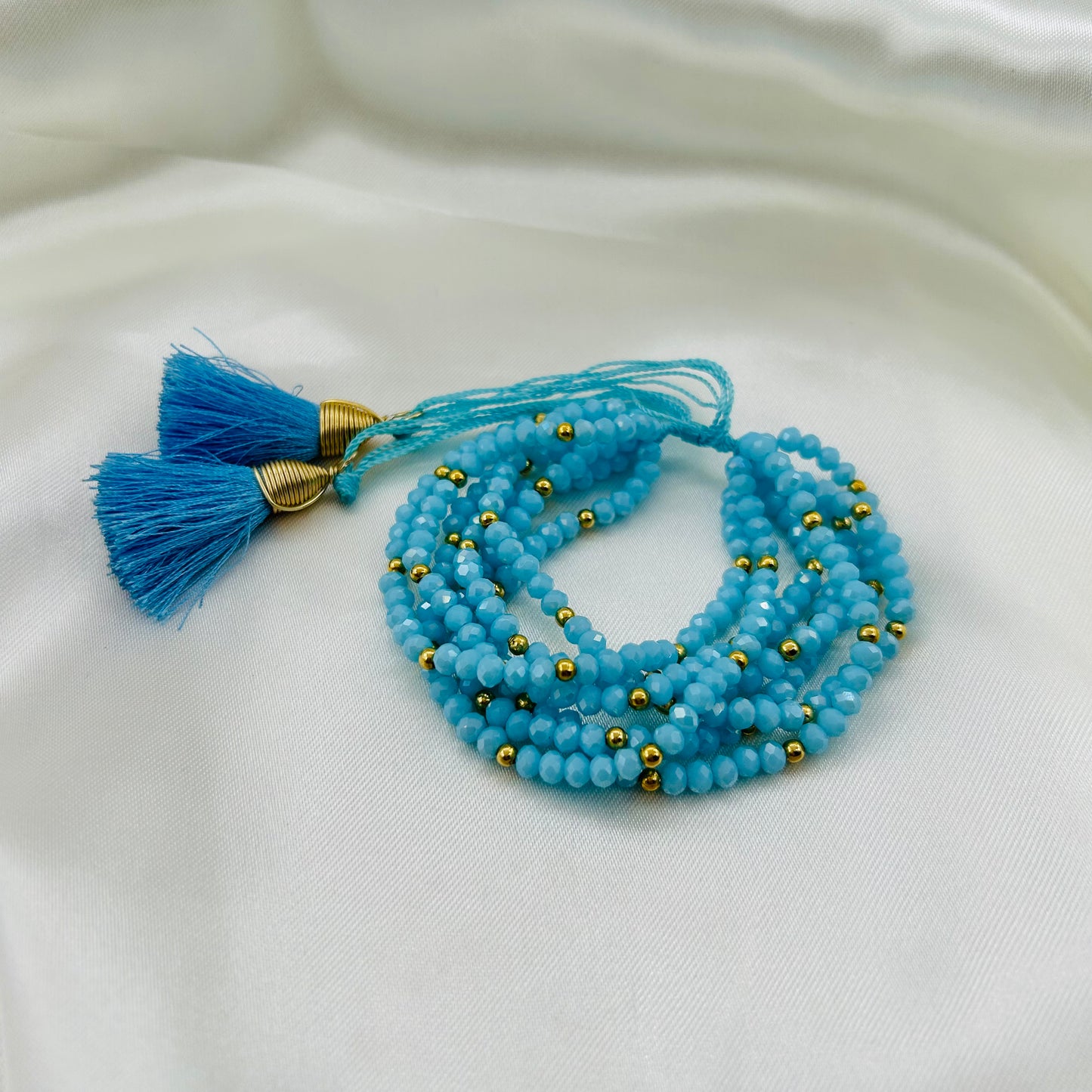 Pulsera de cristal con hilo