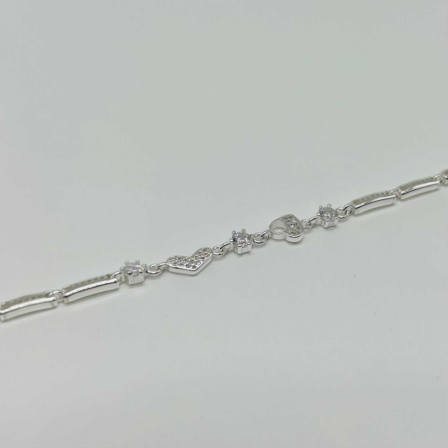 Pulsera Corazones con Plaquitas y Zirconias en Plata