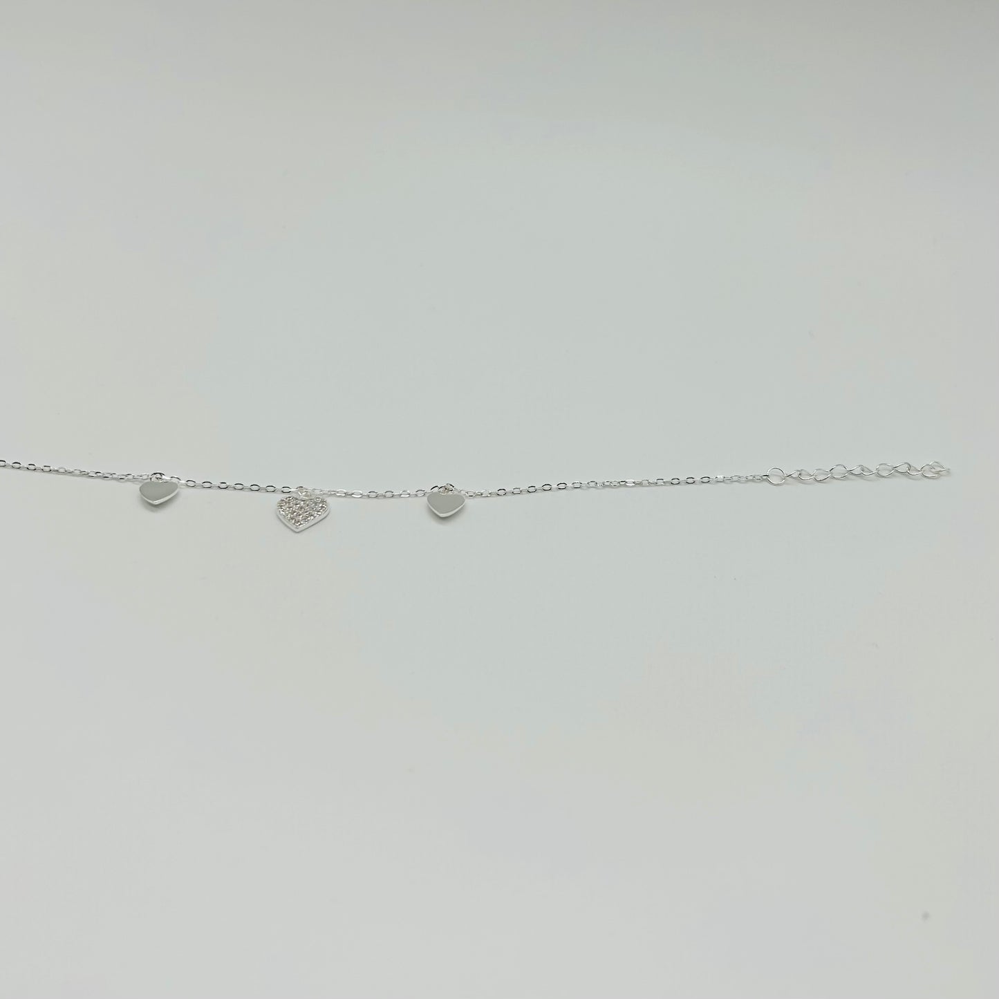 Pulsera Tres Corazones con Zirconias en Plata