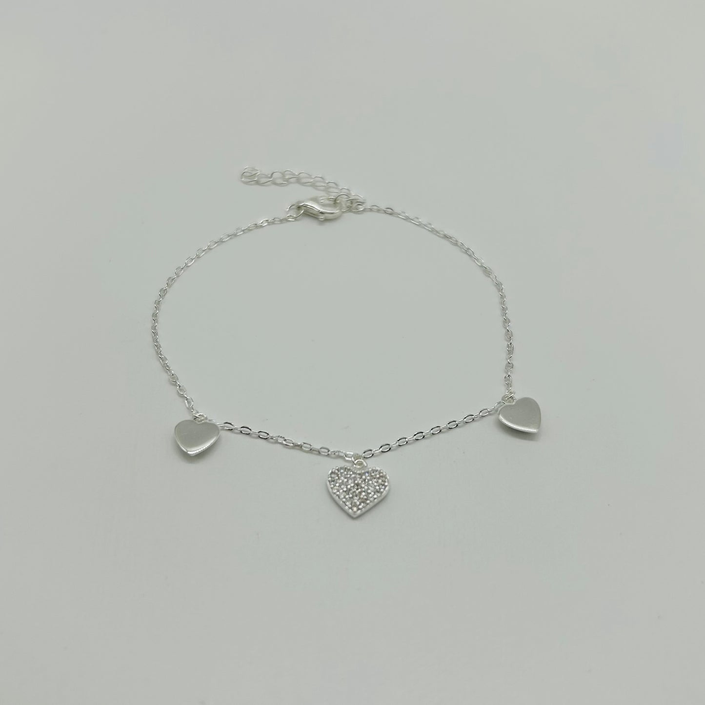 Pulsera Tres Corazones con Zirconias en Plata