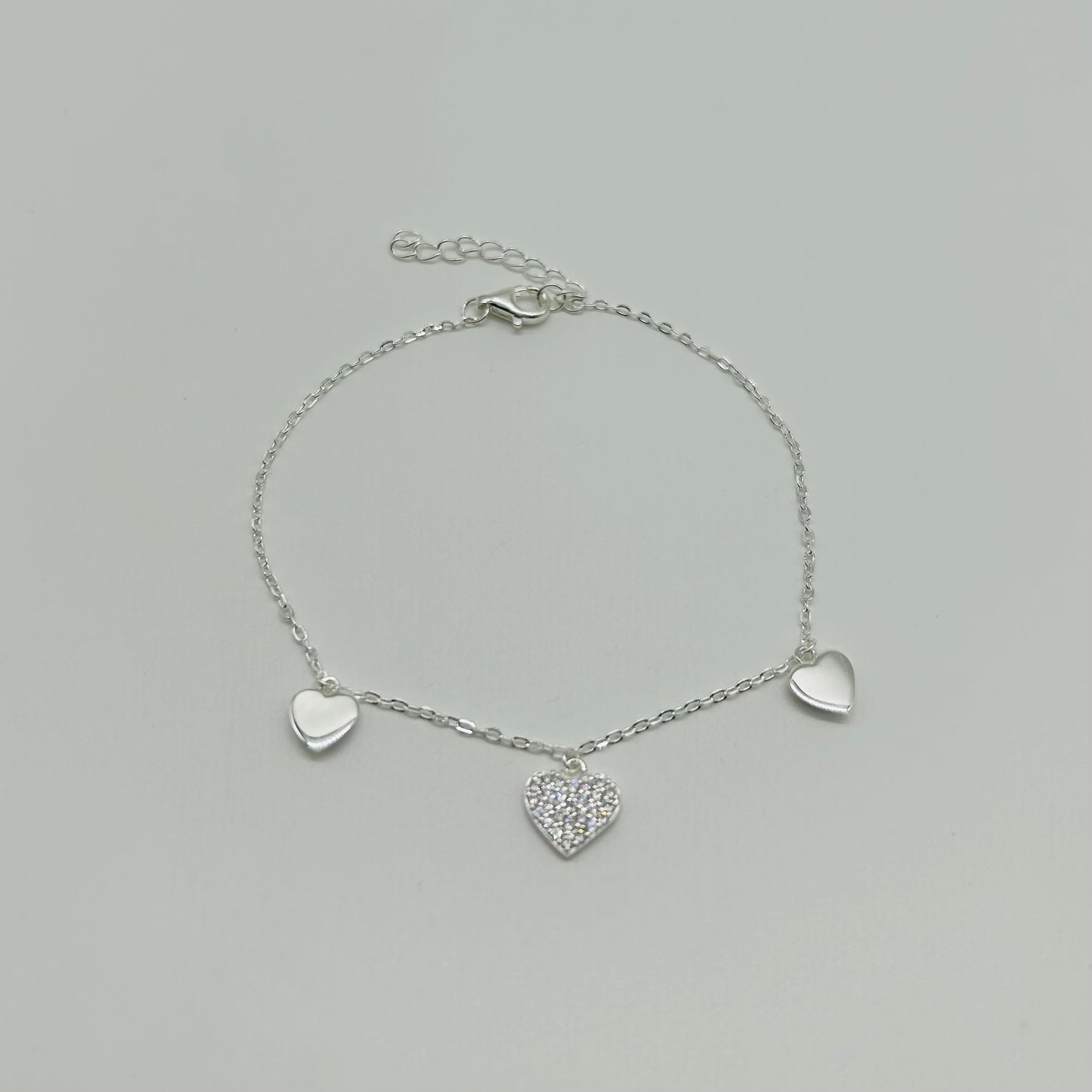 Pulsera Tres Corazones con Zirconias en Plata