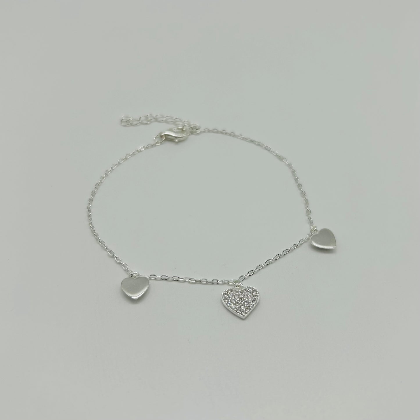 Pulsera Tres Corazones con Zirconias en Plata